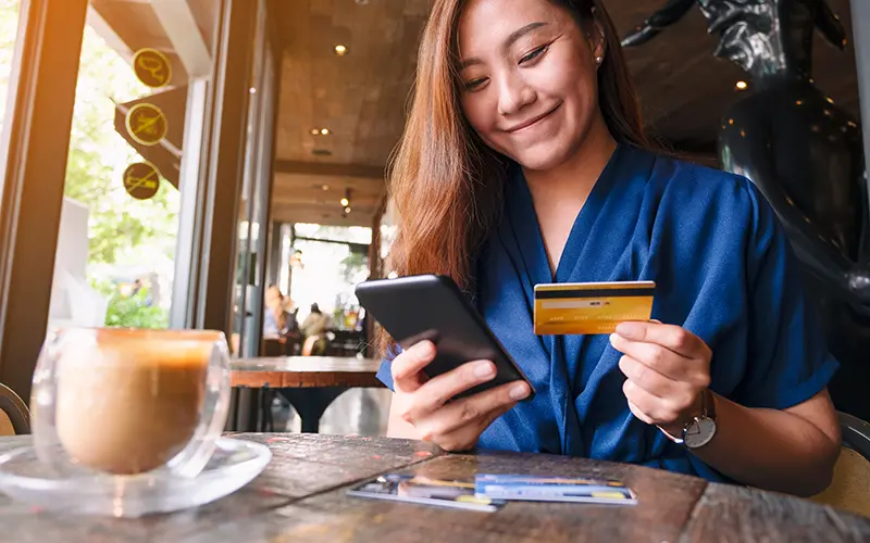 woman with debit card